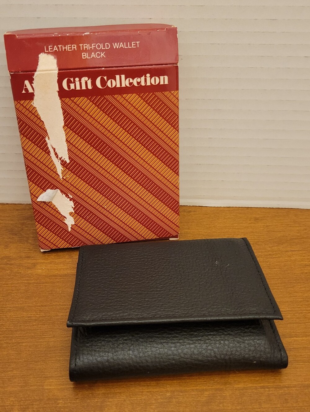 Vtg. Avon Black Leather Tri-Fold Wallet. New in Box
